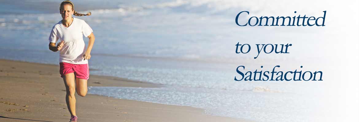 A woman running on a beach. The words 